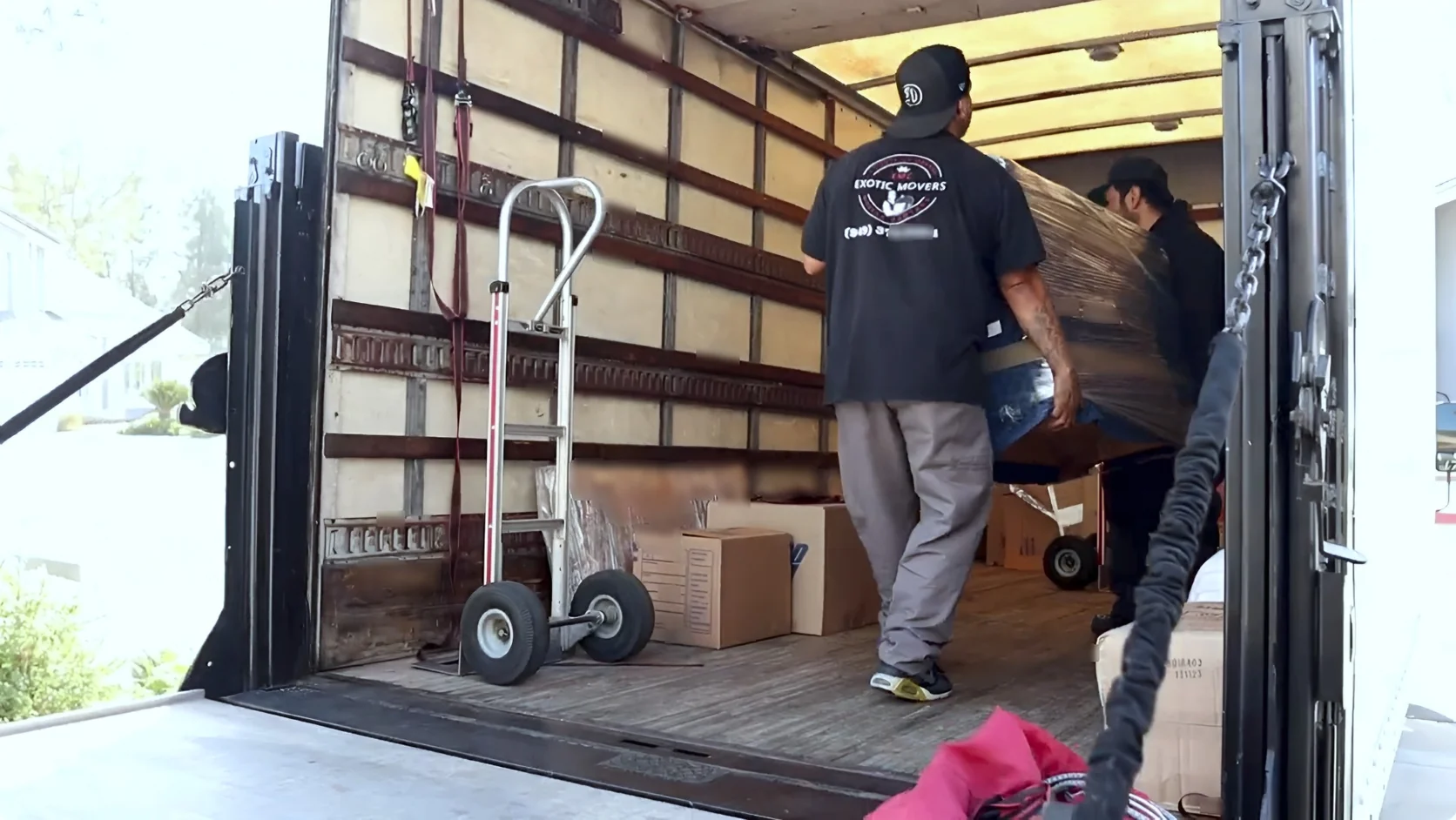 Moving boxes and household items prepared for an apartment move
